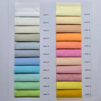 A sample chart displays 18 solid color Fine Cotton Lawn Fabric swatches by Longan Craft in two columns, from white and neutrals to blues, greens, yellows, oranges, and pinks—each labeled with codes.