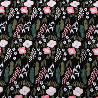 The Longon Craft Floral Cotton Linen Embroidered Fabric By the Yard features white and black cotton linen with pink, white, and blue floral embroidery—ideal for elegant dressmaking or creative projects.