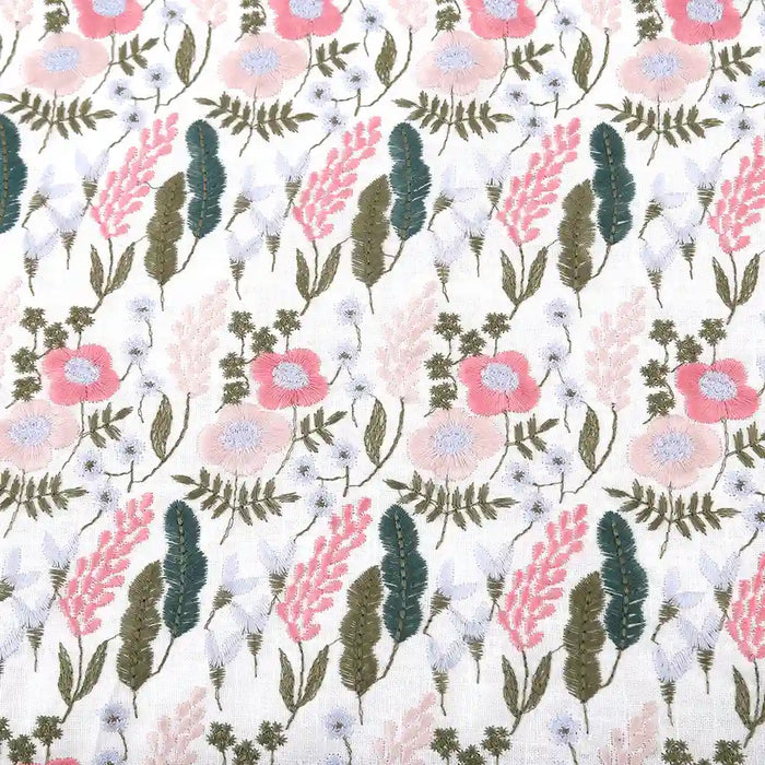 Longon Craft's Floral Cotton Linen Embroidered Fabric by the yard features pink, light blue, and white flower embroidery with green leaves on a white/black cotton linen background—ideal for dressmaking and crafts.