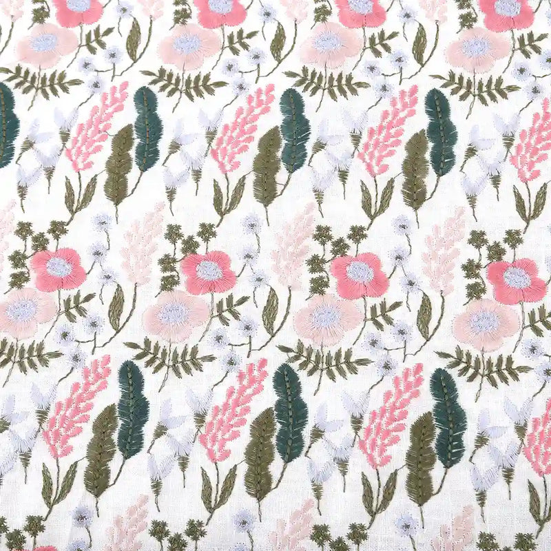 Longon Craft's Floral Cotton Linen Embroidered Fabric by the yard features pink, light blue, and white flower embroidery with green leaves on a white/black cotton linen background—ideal for dressmaking and crafts.