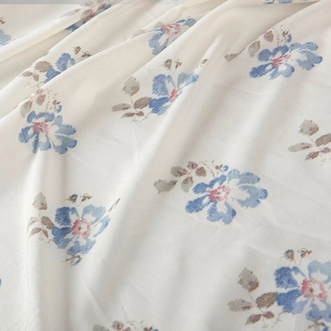 Longan Craft’s Floral Digital Print Voile Fabric by the Yard is a lightweight, breathable cotton with blue and pink watercolor-style flowers and gray leaves—ideal for delicate tops and soft, airy designs.