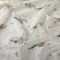 Longan Craft Floral Digital Print Voile Fabric By The Yard features a delicate floral pattern with blue, red, and yellow flowers on lightweight, breathable cotton voile—perfect for tops.