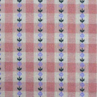Longan Craft Floral Gingham Poplin Fabric by the Yard features a colorful cotton checkered jacquard poplin design, with vertical stripes of small purple flowers and green leaves evenly spaced across a red and white pattern—making it the perfect material for garment making.