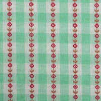 Introducing the “Floral Gingham Poplin Fabric By The Yard” from Longan Craft: a colorful cotton checkered jacquard poplin material featuring green and white checks accented with evenly spaced vertical red and brown floral patterns, crafted from soft printed cotton—perfect for garment making.