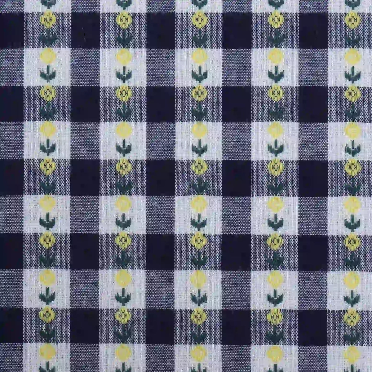 Longan Craft’s Floral Gingham Poplin Fabric By The Yard features a colorful black and white checkered jacquard poplin material with delicate small yellow flowers and green stems centered in alternating white squares, printed on soft cotton—perfect for garment making.