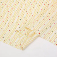 Longan Craft’s Floral Gingham Quilting Fabric By The Yard features a yellow and white botanical pattern with red, pink, and green flowers—made from comfy polyester and perfect for quilting or casual wear.