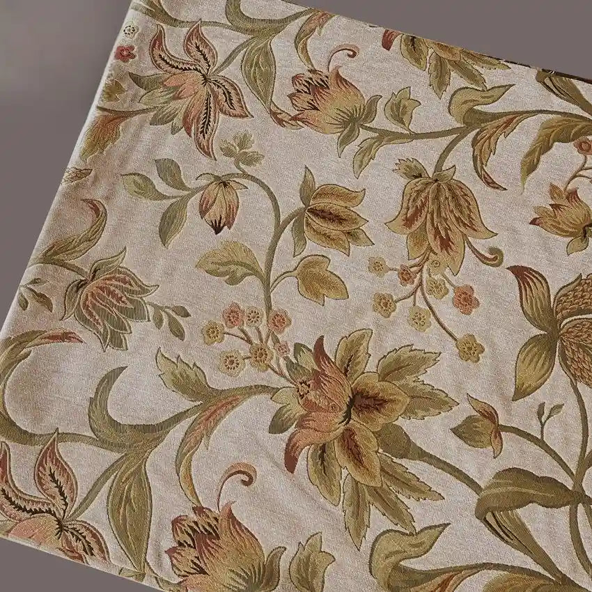 The Longan Craft Floral Jacquard Chenille Fabric By The Yard is a heavyweight poly chenille upholstery fabric in beige with an intricate green, gold, and brown floral pattern—perfect for elegant home decor projects.