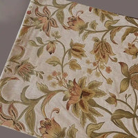The Longan Craft Floral Jacquard Chenille Fabric By The Yard is a heavyweight poly chenille upholstery fabric in beige with an intricate green, gold, and brown floral pattern—perfect for elegant home decor projects.