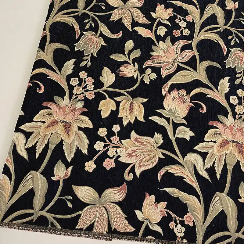 Longan Craft’s Floral Jacquard Chenille Fabric By The Yard features a black background with ornate beige, pink, and green floral patterns—ideal heavyweight poly chenille upholstery fabric for stylish home decor.