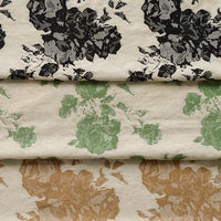 The Longan Craft Floral Jacquard Cotton Linen Fabric By The Yard features three layers—black, green, and brown floral patterns on a beige background—ideal multicolor botanical material for DIY dressmaking.