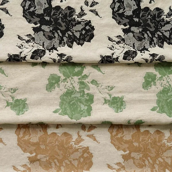 The Longan Craft Floral Jacquard Cotton Linen Fabric By The Yard features three layers—black, green, and brown floral patterns on a beige background—ideal multicolor botanical material for DIY dressmaking.