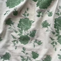 Longan Craft Floral Jacquard Cotton Linen Fabric features a multicolor botanical flower pattern on a light gray cotton-linen blend, ideal for dressmaking and DIY projects. Available by the yard.