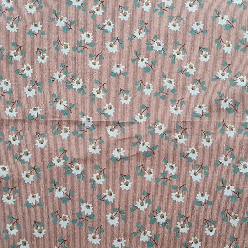 Longan Craft’s Floral Printed Peachskin Fabric by the yard features soft microfiber polyester with small white flowers, yellow centers, and green leaves on a light brown striped background—ideal for comfy apparel.