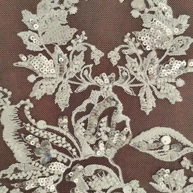 Longan Craft's Floral Sequin Embroidered Tulle Fabric by the yard features heavyweight flower embroidery and sequins on sheer mesh—ideal as a perfect wedding tulle material or for creating elegant gowns and special occasion garments.