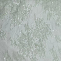 Longan Craft’s Floral Sequin Lace Fabric By The Yard features sparkling, colorful floral lace—ideal for elegant evening gowns or bridal wear. This delicate material adds subtle shimmer to any dress creation.