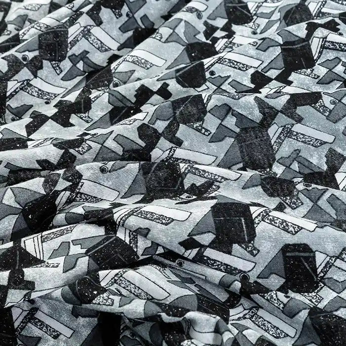 A close-up of Longan Craft's Floral and Animal Printed Jersey Fabric, made from 100% cotton jersey, showcases its soft texture and vibrant pattern—ideal for dresses and clothing projects by the yard.