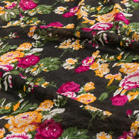 The Longan Craft Floral and Animal Printed Jersey Fabric By The Yard is a 100% cotton jersey, ideal for dresses. It features a black base with floral and animal prints, offering a soft drape and stylish texture for creative sewing projects.