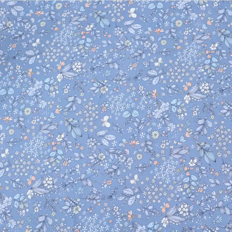 Longan Craft's Floral Animal Printed Microfiber Peachskin Fabric by the yard features delicate multicolor flowers and leaves on a light blue background, creating a gentle, airy feel—ideal polyester peachskin material for dresses.