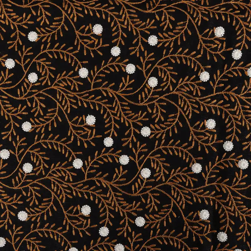 Longan craft’s Flower Embroidered Linen Fabric By The Yard features black linen adorned with brown leafy vines and white floral embroidery, offering a delicate, breathable texture—ideal sewing fabric for dresses.