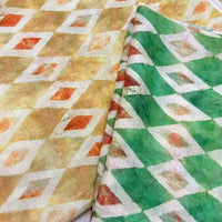 Here’s a rewritten version incorporating the given product data: The Longan Craft Geometric Printed Ramie Fabric By The Yard features two pieces of vintage-inspired material, each adorned with a repeating white diamond motif and a subtly textured finish. One fabric showcases vibrant orange and yellow tones, while the other displays refreshing green shades—both ideal for creating DIY summer dresses and geometric print apparel.