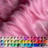 A close-up of Longan Craft's Georgette Silk Fabric by the yard shows soft, flowing 8 momme pure mulberry silk crepe with gentle folds, plus swatches in various shades—neutrals, pastels, brights, and bold colors.