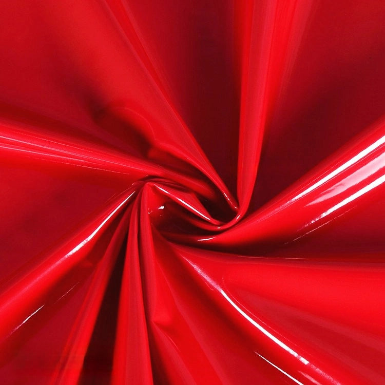 Longan Craft's Glossy Stretch Vinyl Fabric by the Yard features a shiny solid color PU vinyl, perfect for making jackets, with a smooth, reflective finish and mirror-like folds.