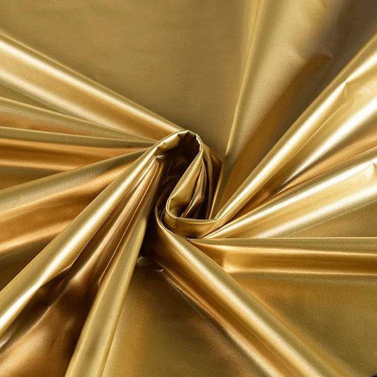 Longan Craft’s Glossy Stretch Vinyl Fabric by the yard features a smooth, shiny PU surface that gathers and twists beautifully, creating eye-catching folds and reflections—perfect for making jackets with lustrous texture.