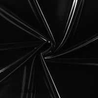 Close-up of Longan Craft Glossy Stretch Vinyl Fabric by the yard, a shiny solid color PU material perfect for making jackets, shown twisted into a spiral with reflective folds and smooth lines.