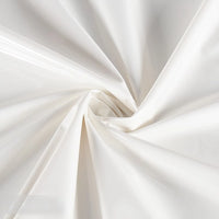 Close-up of Longan Craft’s Glossy Stretch Vinyl Fabric By The Yard, a solid color shiny PU vinyl perfect for jackets. Gentle folds swirl from the center, as light reflects off its smooth mirror finish.