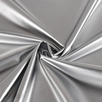 Longan Craft’s Glossy Stretch Vinyl Fabric By The Yard features solid color shiny PU vinyl gathered and twisted at the center, creating soft folds and a reflective, smooth finish—perfect for making jackets.