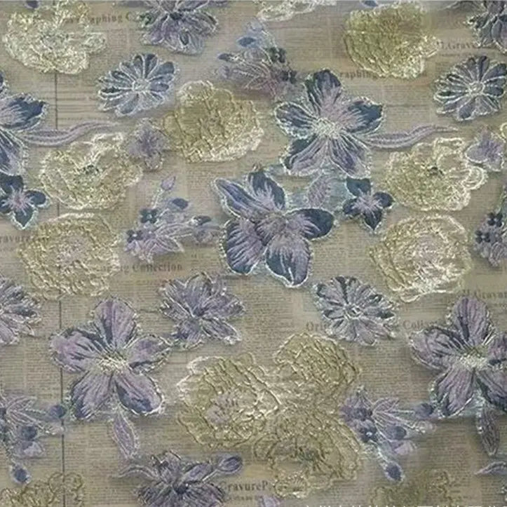 Golden Floral Jacquard Organza Fabric by Longan Craft features elegant purple floral patterns on sheer organza, perfect for dressmaking, with its delicate design allowing subtle background elements to show through.