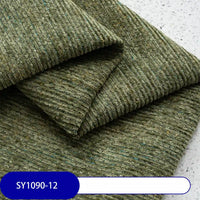 Heavy Weight Slub Chenille Fabric by Longan Craft, shown in green with ribbed texture and blue SY1090-12 label, offers thick premium polyester ideal for stylish upholstery. Available by the yard for versatile décor projects.
