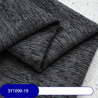 Close-up of Heavy Weight Slub Chenille Fabric By The Yard from Longan Craft, featuring thick, textured dark gray polyester with blue flecks (SY1090-19), ideal for modern interiors desiring premium heathered upholstery chenille.