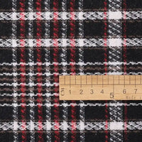 A Longan Craft Heavyweight Cotton Checked Flannel Fabric By The Yard—Polyester Brushed Mammoth Flannel Clothing Material—is shown beneath a wooden ruler spanning approximately 8 cm, measuring the width of its black, white, and red checked pattern. This vintage fall winter flannel textile is ideal for cozy seasonal sewing projects.
