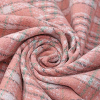 Close-up of Longan Craft’s Heavyweight Cotton Checked Flannel Fabric by the yard, featuring a soft, pink and white checked pattern with green accents in a swirled spiral, highlighting the texture and cozy appearance of this polyester-brushed mammoth flannel—perfect for vintage fall and winter clothing projects.