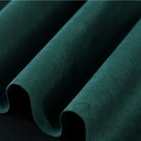 Close-up of Longan Craft’s Heavyweight Microfiber Faux Suede Fabric by the yard, draped in soft, smooth folds to showcase its rich multicolor hues and plush, brushed microsuede texture—an ideal material for DIY clothing projects.