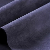 Close-up of folded Heavyweight Microfiber Faux Suede Fabric by Longan Craft in dark blue, highlighting its soft, velvety texture and smooth surface—an ideal choice for DIY clothing projects and more.
