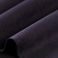 Close-up of Heavyweight Microfiber Faux Suede Fabric by the yard from Longan Craft, featuring multicolor brushed microsuede material with a soft, smooth texture and gentle folds that showcase its rich color and luxurious appearance—perfect for DIY clothing projects.