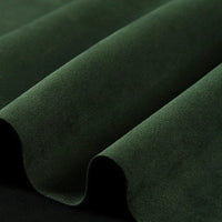 Close-up of folded Longan Craft Heavyweight Microfiber Faux Suede Fabric in a dark green shade, highlighting its soft texture and smooth, luxurious microsuede surface—perfect for DIY clothing projects.