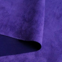 Close-up of a folded piece of vibrant purple Heavyweight Microfiber Faux Suede Fabric By The Yard by Longan Craft, highlighting its soft brushed surface and smooth heavy texture—perfect as an upholstery fabric or for DIY clothing projects that need high-quality imitation suede.