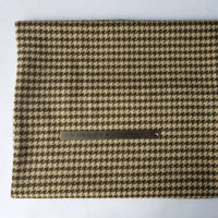 The Longan Craft Houndstooth Mammoth Flannel Fabric by the yard, a soft beige and brown brushed polyester cotton blend, is shown laid flat with a metal ruler on a plain light background for scale.
