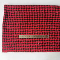 A piece of Longan Craft Houndstooth Mammoth Flannel Fabric is laid flat with a metal ruler on top, measuring about 12 inches across; this brushed polyester-cotton flannelette is perfect for comfy fall projects.