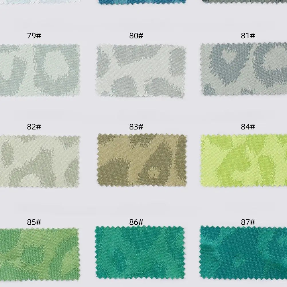 Twelve Longan Craft Leopard Jacquard Satin Fabric swatches (79#-87#) in grey, beige, green, and teal are arranged in three rows. This multicolor polyester satin features a subtle animal print—ideal for DIY shirts.