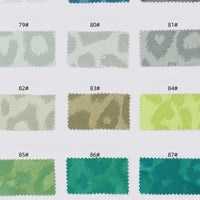 Twelve Longan Craft Leopard Jacquard Satin Fabric swatches (79#-87#) in grey, beige, green, and teal are arranged in three rows. This multicolor polyester satin features a subtle animal print—ideal for DIY shirts.