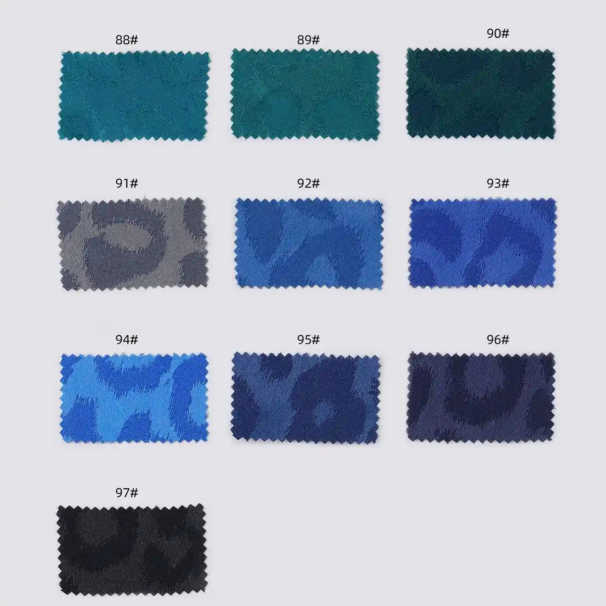 Eleven rectangular swatches (#88–97) from Longan Craft showcase blue, green, gray, and black animal patterns on white Leopard Jacquard Satin Fabric—a soft, smooth polyester satin perfect for DIY shirts.