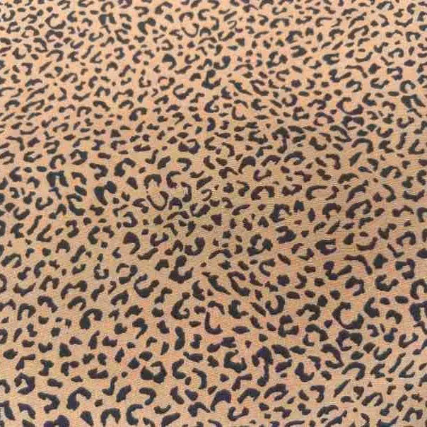 Leopard Print Chiffon Fabric By The Yard in sheer tan with a black leopard print pattern.