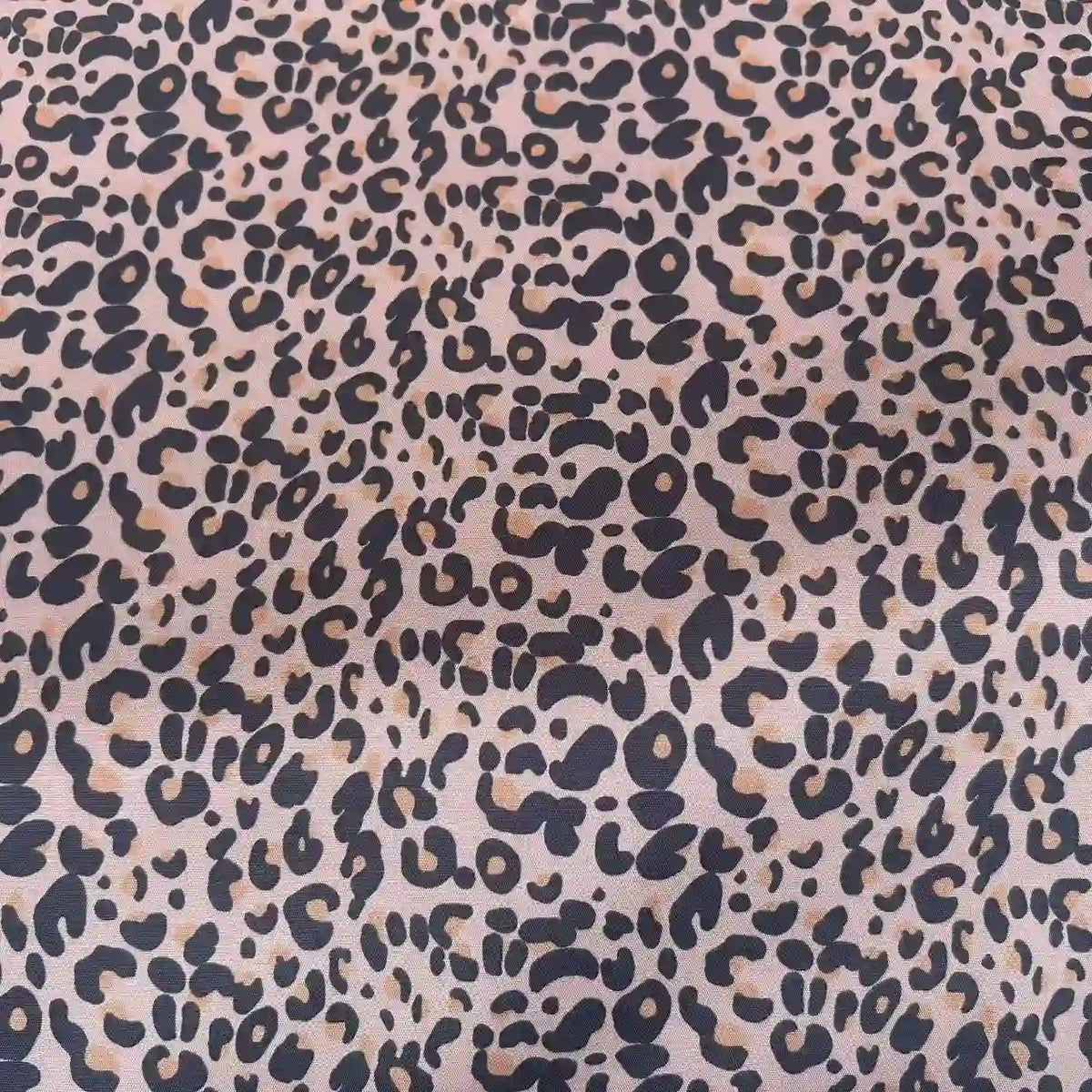 Leopard Print Chiffon Fabric By The Yard in sheer, soft polyester featuring a black and brown animal print pattern on a light tan background.