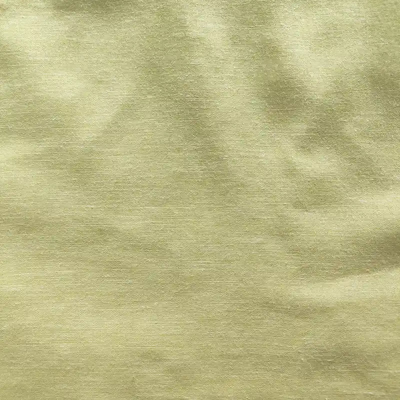 Textured green fabric pattern