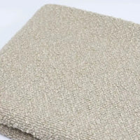 Folded swatch of beige textured Linen Grain Boucle Fabric By The Yard.