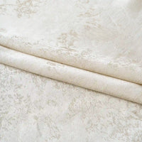 The Longan Craft Linen Viscose Jacquard Satin Fabric By The Yard features a light beige shade and a subtle, intricate floral pattern. Displayed neatly folded, this luxury rayon satin material showcases a soft texture with a gentle sheen, highlighting the delicate jacquard design—making it an elegant choice for dresses and special projects.